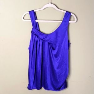 5. Jennifer Lopez Violet Sleeveless Blouse